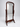 Carved Dark Wood Cheval Mirror with Scroll Feet