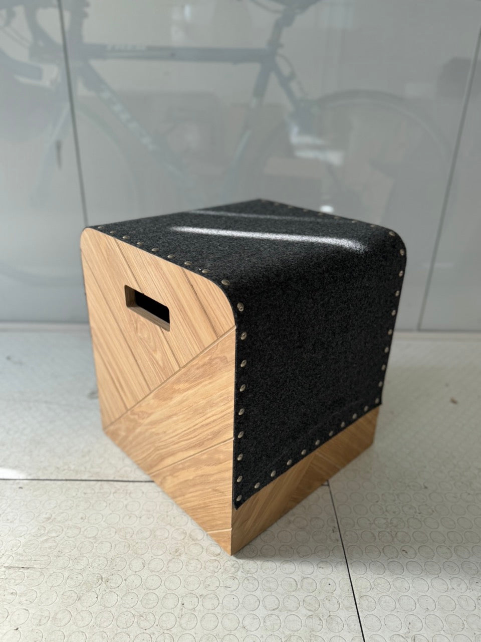 Heavy wood stool in grey felt, turquoise leather and burnt Sienna leather and black textured rubber (4)