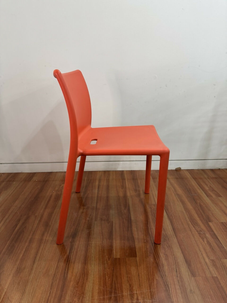 orange-stackable-chair-side