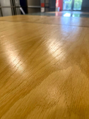 Long Plywood and steel table with display section