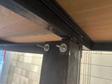 Long Plywood and steel table with display section