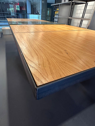 Long Plywood and steel table with display section