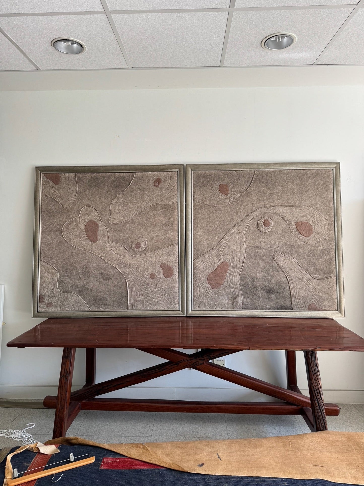 Two large square felt artworks