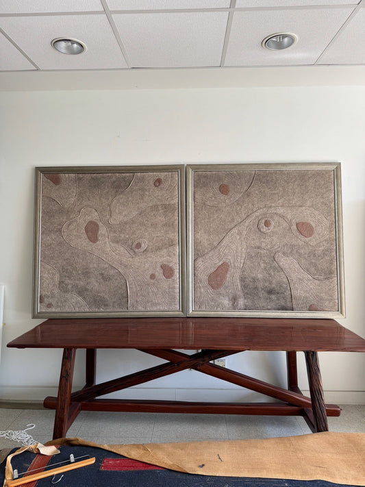 Two large square felt artworks