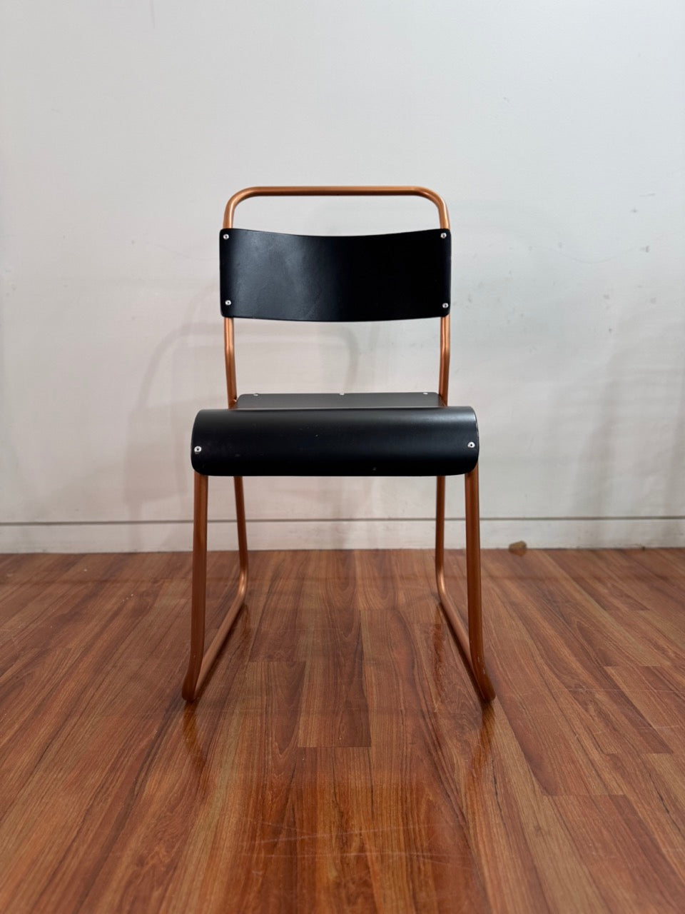 Vintage stackable chairs - black seat, bronze coloured frame (set of 2)