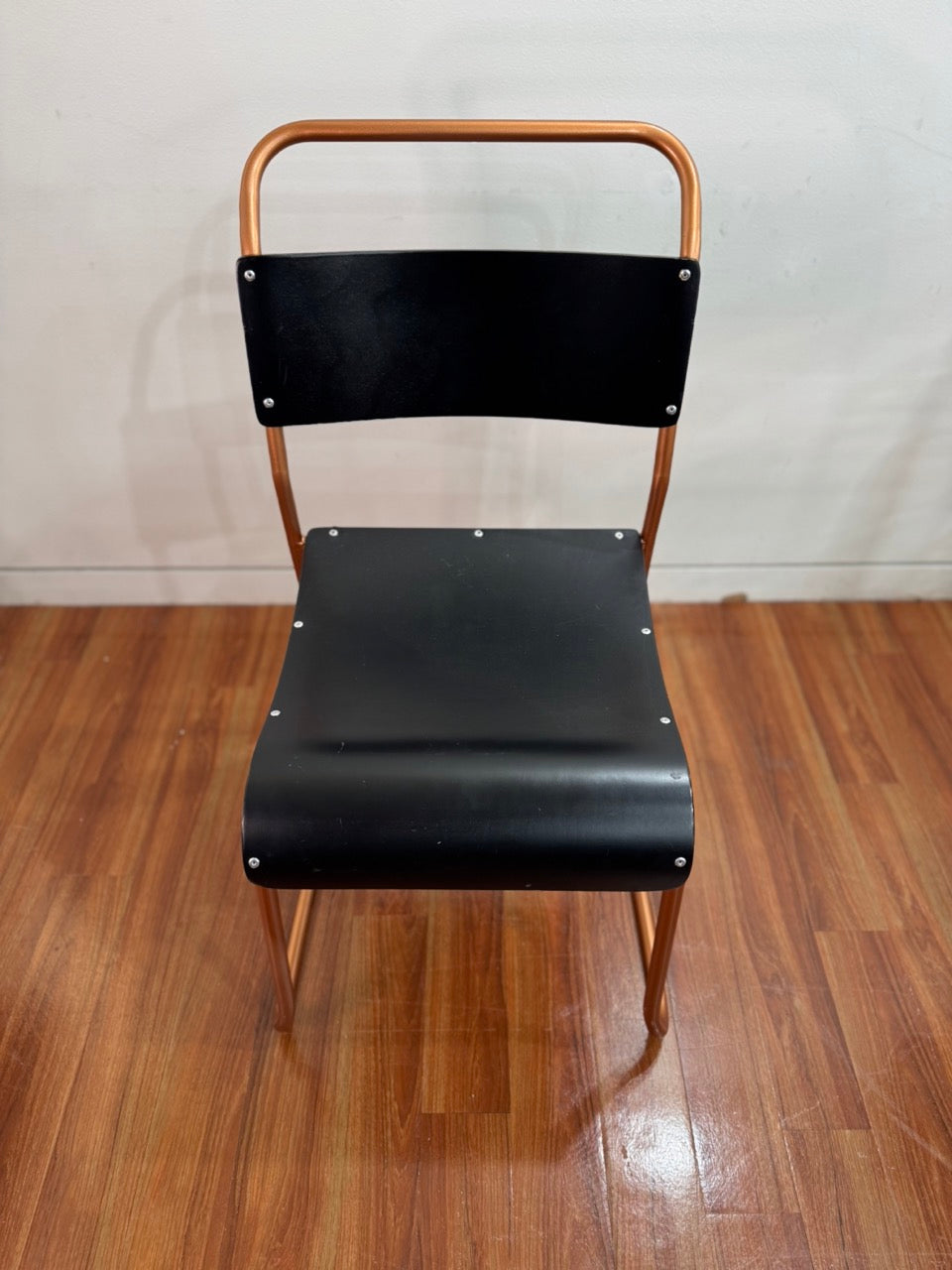 Vintage stackable chairs - black seat, bronze coloured frame (set of 2)